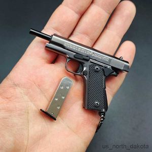 Nowością elementy stopu pistoletu miniaturowy Model Zespół Zabawny Pistolet Klapeta Plecak Pendant Dekoracja Prezentacja Toy Boy R230818