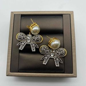 تصميم العلامة التجارية Miumiu أقراط جديدة Bowknot Pearl Star Star Celebrity Exclips Earstuds Female عيد الحب هدايا الإكسسوارات الفاخرة المجوهرات