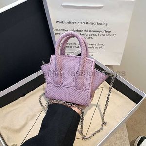 Projektantka Mini Snake Skin Lipstick Handheld Women's 2023 Nowy popularny słodki łańcuch mody Crossbody Bag Caitlin_fashion_bags