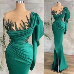 Sexy Evening Dresses Wear Green Satin Jewel Neck Illusion Long Sleeves Crystal Beads Mermaid Side Split Prom Party Gowns Special Ocn