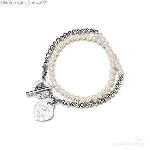 Pendanthalsband Fashion Luxury Halsband Designer Hardwear smycken Hjärtform Doubledeck -kedjor med pärlhalsband för Women Party Rose Z230819