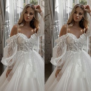 2023 Vintage Bobemian A linha Vestidos de noiva de apliques de ombro Flores de renda Tulle Mangas compridas