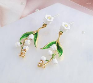 Studörhängen handmålad emaljglasyr vit lilja blommor fransar kvinnors smycken