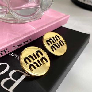 Top Designer MiuMiu Fashion Earrings New Smooth Face Gold Hollow M Letter Circle Earrings Copper Plated Gold Simple Style Earrings Valentine's Accessories Jewelry