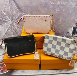 Marca de luxo feminino bolsas de moeda clássica letra xadrez manta de damas carteiras de carteira de designer ladrinhas zíperas de bolsas pendentes de decoração de barras de chaves de chaves de chaves de chaves