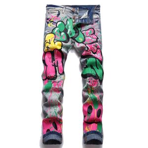 Män jeans män färgade doodle målade denim streetwear punk stretch tryck byxor knappar hål rippade smala blyertsbyxor295c