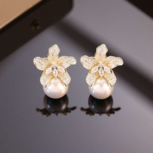 New Lily Flower Pearl Earrings for Women's Light Luxury and High Grade Exquisite Earrings 925 Silver Needle Temperament Versatile Earrings