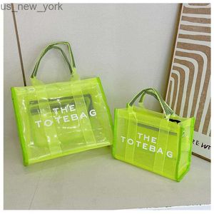 Totes 2023 ny designer tygväska kvinnor transparent geléväska handväska axel crossbody väska strandväskor säck en huvud femme hkd230822