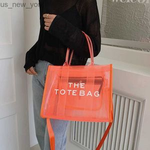 Totes weibliche Jelly -Bag -Buchstabenwendung für Frauen PVC Mesh Ladies TOTE Handtasche wasserdichte transparente Sommerstrandhandtasche HKD230822