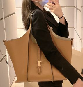 Stor tygväska högkvalitativ kohude kvinnor handväska lyxmetall spänne kvinnor shopping väska designer axelväskor