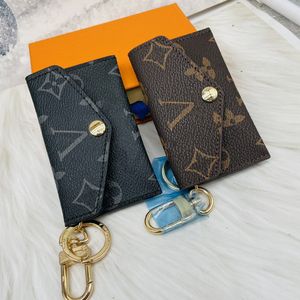 Med dammväskor och låda kvinnor män kvinnor nyckelpåse pochette cles designers mode handväska kvinnor herr kreditkort hållare mynt handväska lyxiga plånbok väska 06