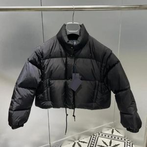 Trenchrock Kvinnor Kvinnor Designer Kläder Vinterdesigner Kvinnsjacka med Monogram Kort jacka Högkvalitativ jacka med löstagbara ärmar varm parka päls