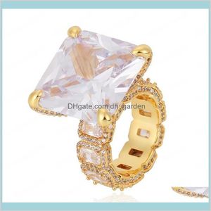 Europe och America Yellow Gold Plated Bling Ice Out Big Diamond Cz Stone för trevliga smycken Z209S Band Rings DR1GP216G