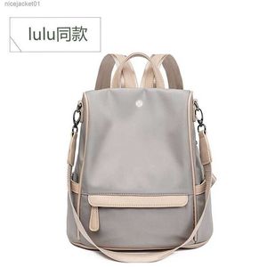 Lulemon Designer Lillumon Bag Ny Business Computer Bag samma axelväska Kvinnors koreanska version Trend Versatil Anti-Poft Canvas Bag Multi-Purpose