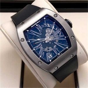 デザイナーラグジュアリーリッチルドミレレススイススイスの有名な腕時計自動機械時計RM023オートマチックメカニカルチタンアロイアウトメンズXC1GY