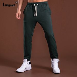 Pantaloni da uomo Ladiguard plus size maschile Solid Still Skinny Skinny Street Sottose Scifine Sexy Laceup Pareri di matite 230822