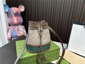 Designer Fashion DrawString Påsar Luxury Mini Bucket Bag Axelväska Portable Kvinnor Läderväska avtagbar axelrem