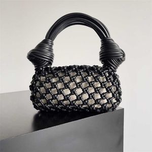 Italien Jodie handväska 23 Nya Lamian Noodles Hollow Bag fårskinn Ren handvävd armhålor Kvinnars väska 24 cm