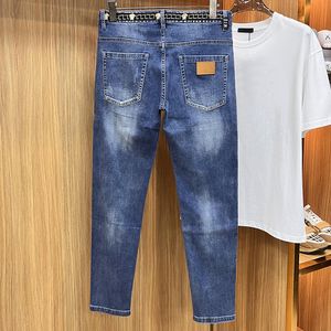 Luxury Jeans Fashion Märke Jeans V Designer Jean för kvinnors europeiska byxor Mens Staplade denim Blue Jeans Brand Pants Megogh-12 CXD8233