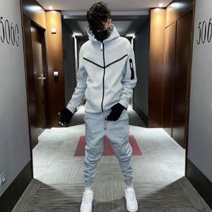 Men's Tracksuits 2023 Spring and Autumn men patchwork sports jogging suit hooded zipper sweatshirt casual pants 230823