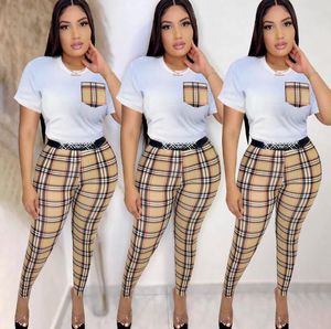 Kvinnors spårningsdräkter 2023 Autumn New Fashion Casual Stripe Checker Set Spliced ​​Pocket Designer Brand Women's Two Piece Set