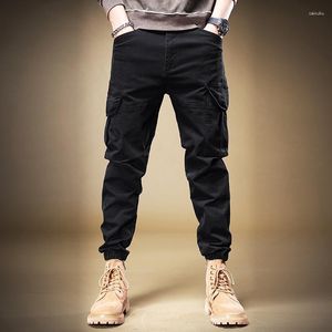 Herr jeans streetwear mode män löst passar stora fickor casual lastbyxor hombre svart gula byxor hiphop joggar övergripande