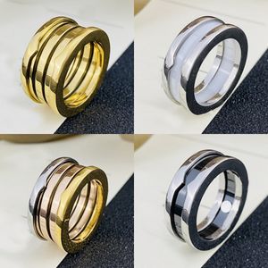 مصممة Rings Rings Brand Ring Ceramic Ring White Black Jewelry Silver Gold Never Fade Band Rings Jewelry Classic Premium Association Exclusive مع ختم منقوش