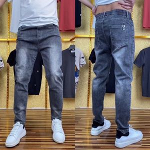 Mäns jeans avsmalnande bomull Löst designer högkvalitativa byxor Stylish 2023 Trend Man Cowboy Pants Stapled Buggy Summer XS 230825