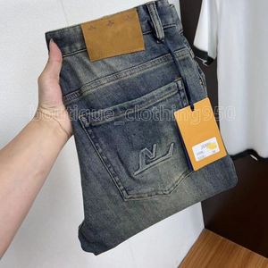 Men jeans modedesigner klassiska bokstäver broderade vinter bomullsmän jeans högkvalitativa stretchbyxor