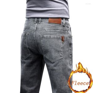 Jeans da uomo in pile invernale pantaloni elasticizzati dritti larghi spessi pantaloni casual da lavoro slim fit alla moda