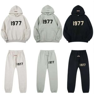 مصمم الرجال لعام 1977 Essentail Hoodie Pants الأزياء العدد غير الرسمي للروح للركض الهيب هوب الأساسي