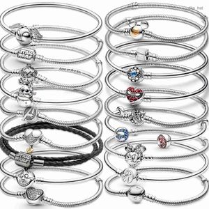 Den nya populära Sterling Sier Charm Armband är lämplig för klassiska kvinnliga smyckeproduktionsmodtillbehör gratis grossist