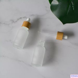 Recipiente de embalagem cosmética clássica fornece 30ml garrafa conta-gotas de madeira de bambu natural garrafa conta-gotas de vidro fosco com tampa de madeira