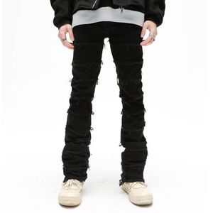 Mäns jeans nödställda rippade staplade streetwear jean herrmode överdimensionerade tofsar denim jeans smala passande byxor män design kläder 230825