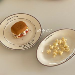皿プレートladycc韓国のアルファベットデザートプレートウエスタンフードセラミックブレックファーム楕円形の北欧の小さな新鮮な食器230825
