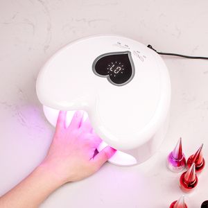 Secadores de unhas 96W Lâmpada de unhas UV LED Secador de unhas Luz vermelha Forma de coração para curar gel polonês Alta potência 96W Nails Art Manicure Lâmpadas elétricas 230824