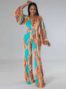 Kvinnors jumpsuits Rompers Women's Elegant Printed Jumpsuit Fashion Long Sleeve Lace Top midja breda ben Jumpsuit 2023 Kvinnors mode täta T230825