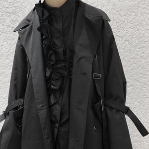 Rów męskich płaszcza Średni długi płaszcz czarny rękawowy wiatrowa wiosna i jesienna moda duża bandaż 230825