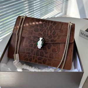 Neue Frauen Designer -Umhängetaschen funkelnde Schlangenhaut Handtaschen Mode echte Lederkreuzkörperbeutel trendige goldene Ketten Schlangenschnalle 8657