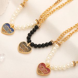 Set di gioielli Orecchini a cuore Collana Designer di marca di lusso Lettera Pendenti Collane Collana girocollo in acciaio inossidabile Collana con ciondolo Catena di perle Accessori per gioielli