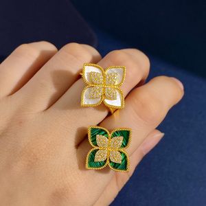 2023 Nova marca de luxo de quatro folhas trevo designer banda anéis para mulheres meninas flor doce brilhando cristal diamante amor anel festa jóias de casamento