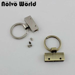 Аксессуары для запчастей для пакетов Nolvo World 520100pcs 2 цвета 4530 мм Ключевое оборудование для брелка с кольцом высокого уровня держателя кольца 230823