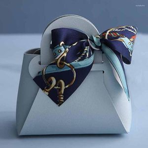 Present Wrap Leather Påsar Bow Ribbon Packaging Bag Wedding Favor Distributioner Christmas Candy Box Jewelry Mini Handväska