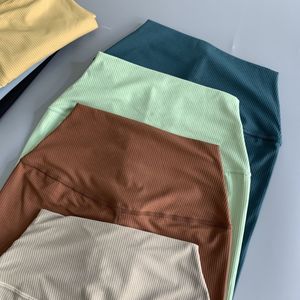 LL Collant a costine spogliati nudi Vestito da yoga modellante ad alta elasticità Leggings da corsa Pantaloni per il sollevamento dell'anca ad alta elasticità K233