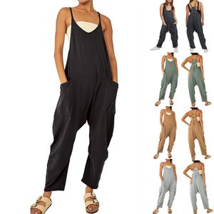 Kvinnors jumpsuits rompers kvinnor avslappnad jumpsuit sommar solida lösa breda ben byxor haklappar mode ficka ärmlös rems baggy streetwear rompers 230828