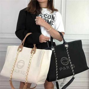 Bolsas de liquidação 70% de desconto bolsas baratas moda clássica bolsas de praia bolsas femininas pérola bolsa de noite feminina lona portátil tendência de luxo grande bolsa feminina mochila