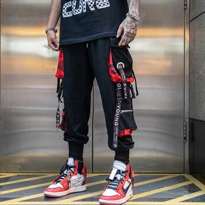 Mäns byxor Herrlastbyxor Casual Hip Hop Hit Color flera fickor byxor Streetwear Ribbons Techwear Sweatpants 230828