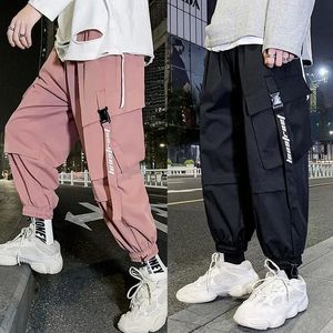 Calças masculinas calças de carga moda masculina solta casual pantalones hombre rosa hip hop calças esportivas japonês streetwear preto sweatpants 230828