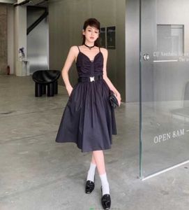 Kobiety seksowne sukienki sukienka Sukienka Letnia projektant długą spódnicę z odwróconą klatką trójkątną sukienką imprezową swobodne spódnice czarne białe