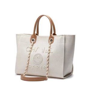 Модные женские роскошные пляжные сумки бренд CH Canvas Dembag Designer Classics Rackpacks Pearl Ladies Большой вечерние сумочки кошелек женщин Большой рюкзак ручной сумки x3w6